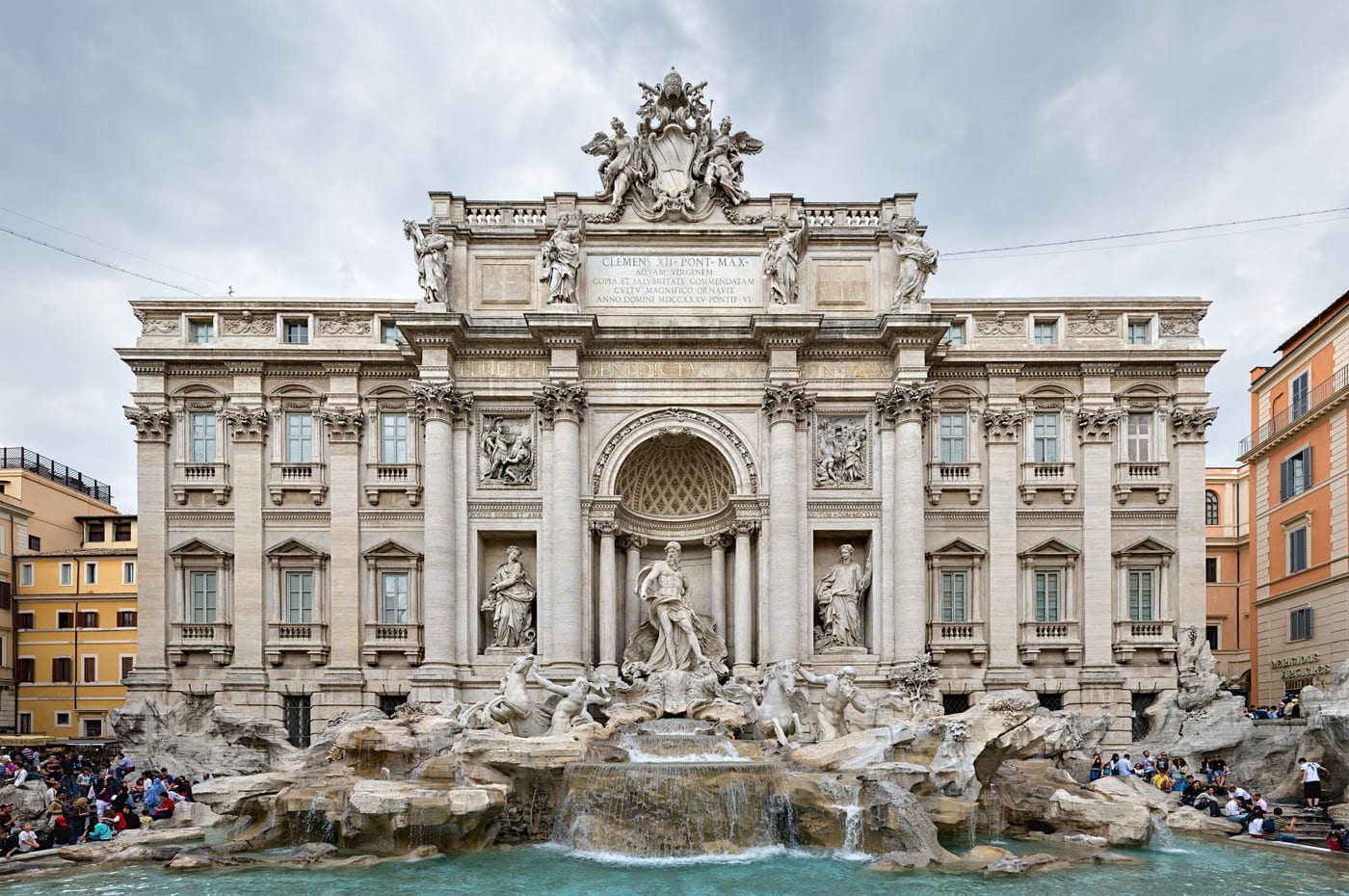 Throw a coin into the Trevi Fountain